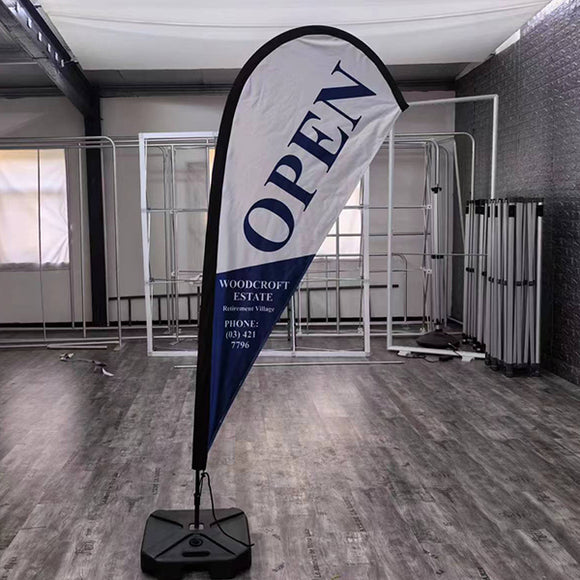 Promoting Your Real Estate Management Business with Teardrop Flags